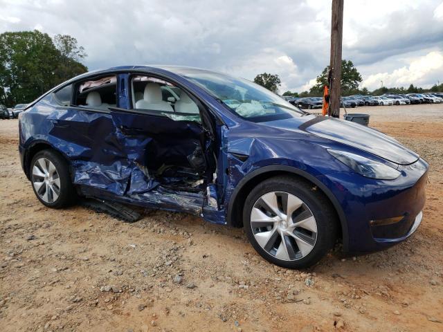 Photo 4 from auction – 2023 TESLA MODEL Y with VIN 7SAYGDEE3PF670666