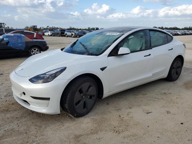 TESLA MODEL 3 2023 with VIN 5YJ3E1EA9PF497390 - Photo from auction