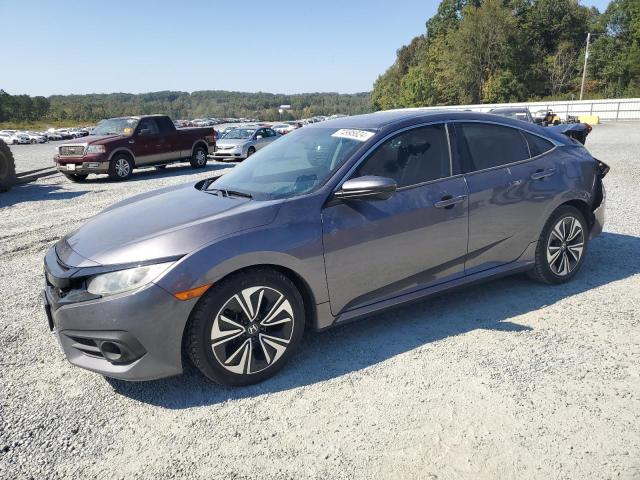 Photo 1 from auction – 2016 HONDA CIVIC EX with VIN 19XFC1F37GE004539