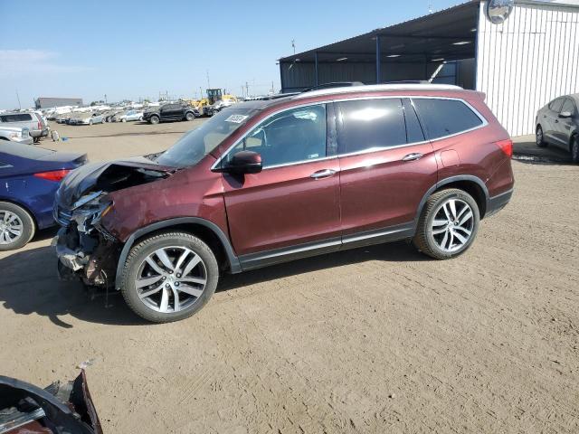 HONDA PILOT TOUR 2018 with VIN 5FNYF6H90JB046308 - Photo from auction