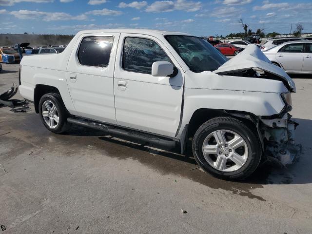 Photo 4 from auction – 2014 HONDA RIDGELINE with VIN 5FPYK1F54EB009368