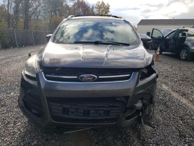 Photo 5 from auction – 2015 FORD ESCAPE TIT with VIN 1FMCU9J91FUA05336
