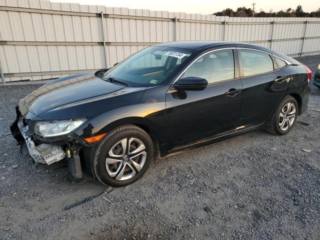 HONDA CIVIC LX 2017 with VIN 2HGFC2F58HH551835 - Photo from auction