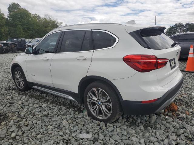 Photo 2 from auction – 2017 BMW X1 XDRIVE2 with VIN WBXHT3Z37H4A57010