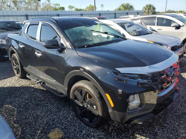 Photo 4 from auction – 2023 HYUNDAI SANTA CRUZ with VIN 5NTJCDAF4PH063669