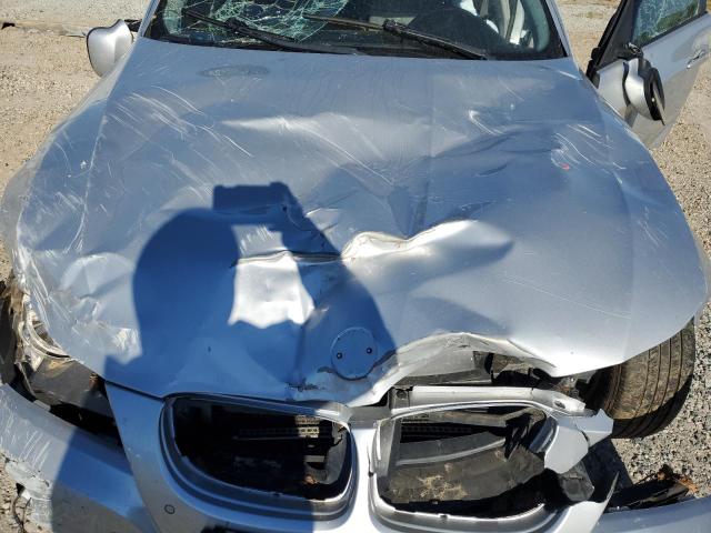 Photo 11 from auction – 2009 BMW 328 I with VIN WBAPH77519NM28707
