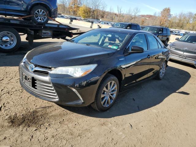 Photo 1 from auction – 2016 TOYOTA CAMRY HYBR with VIN 4T1BD1FK5GU185057