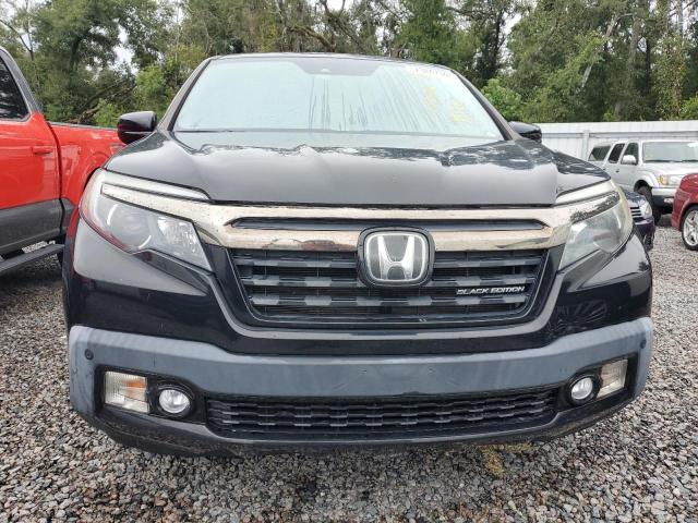 Photo 5 from auction – 2018 HONDA RIDGELINE with VIN 5FPYK3F83JB008566