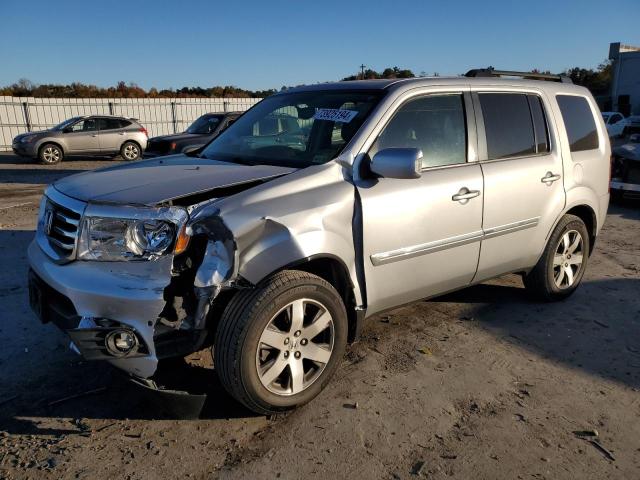 HONDA PILOT TOUR 2015 with VIN 5FNYF4H96FB016211 - Photo from auction