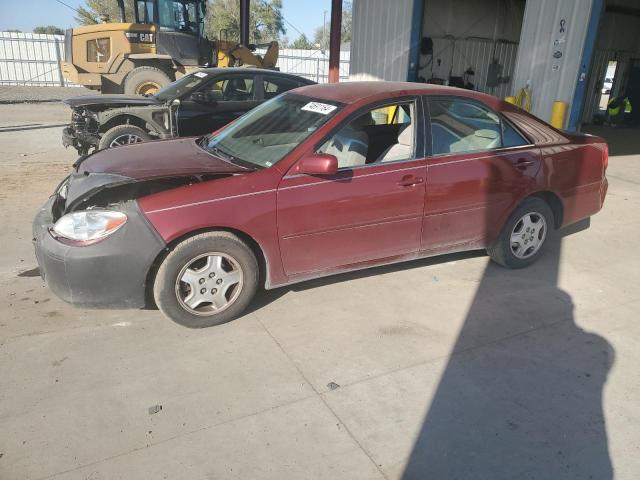 TOYOTA CAMRY LE 2002 with VIN 4T1BF32K92U027440 - Photo from auction
