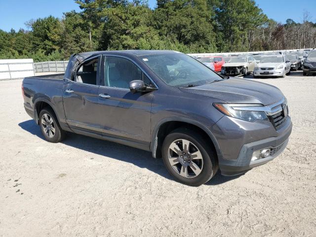 Photo 4 from auction – 2019 HONDA RIDGELINE with VIN 5FPYK3F72KB015386