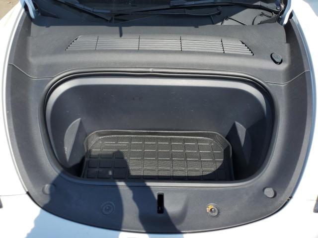 Photo 11 from auction – 2023 TESLA MODEL Y with VIN 7SAYGDEE0PA112111