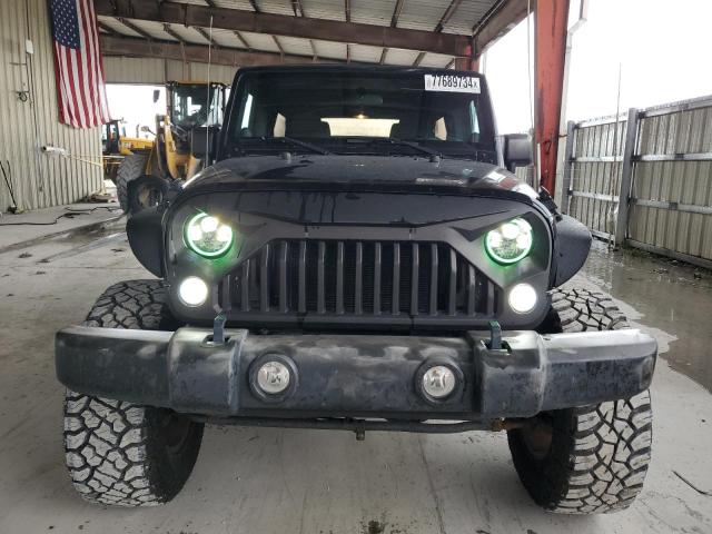 Photo 5 from auction – 2011 JEEP WRANGLER U with VIN 1J4BA3H18BL566665