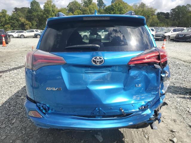 Photo 6 from auction – 2017 TOYOTA RAV4 LE with VIN JTMZFREV8HJ101694