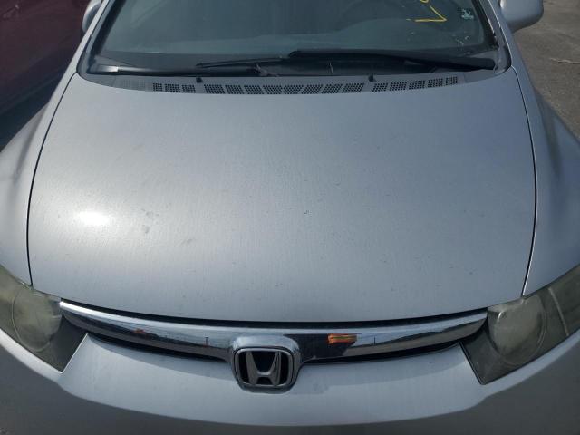 Photo 11 from auction – 2007 HONDA CIVIC EX with VIN 1HGFA16857L103290