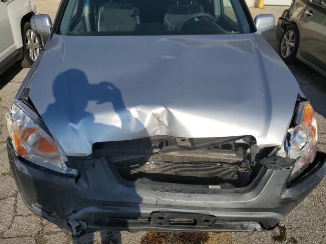 Photo 12 from auction – 2004 HONDA CR-V EX with VIN JHLRD78804C036843