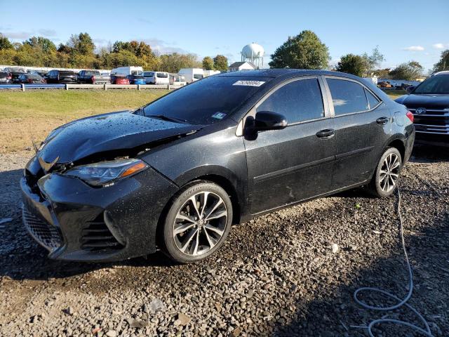 TOYOTA COROLLA L 2017 with VIN 2T1BURHE8HC828462 - Photo from auction