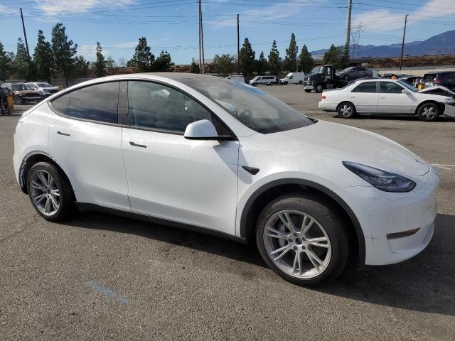 Photo 4 from auction – 2023 TESLA MODEL Y with VIN 7SAYGDEE0PA102937