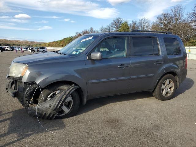 HONDA PILOT EXLN 2011 with VIN 5FNYF4H79BB012887 - Photo from auction