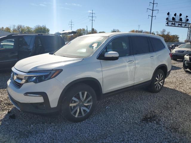 HONDA PILOT EXL 2021 with VIN 5FNYF6H57MB097841 - Photo from auction