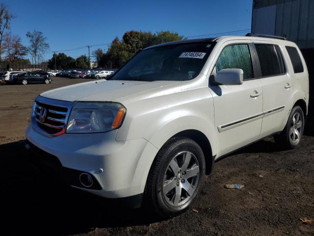 HONDA PILOT TOUR 2015 with VIN 5FNYF4H99FB040650 - Photo from auction