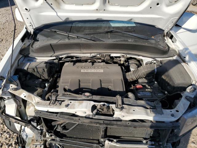 Photo 11 from auction – 2014 HONDA RIDGELINE with VIN 5FPYK1F59EB001735