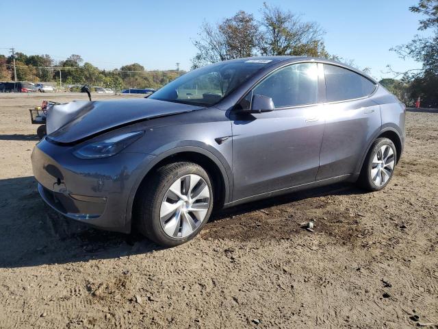 TESLA MODEL Y 2023 with VIN 7SAYGDEE9PA195182 - Photo from auction