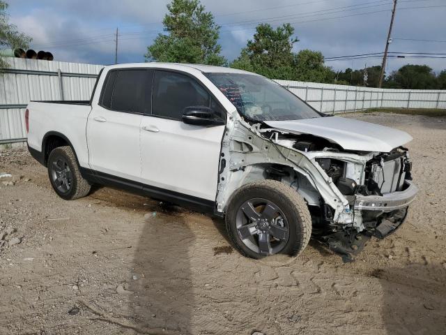 Photo 4 from auction – 2024 HONDA RIDGELINE with VIN 5FPYK3F68RB016219