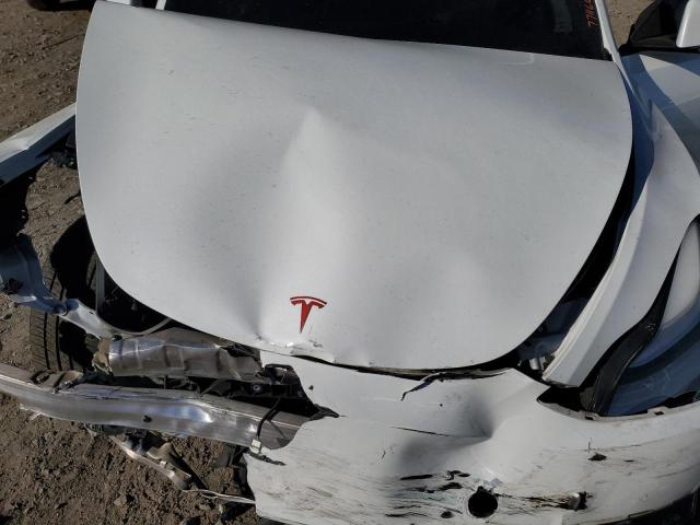 Photo 11 from auction – 2021 TESLA MODEL Y with VIN 5YJYGDEE6MF115378