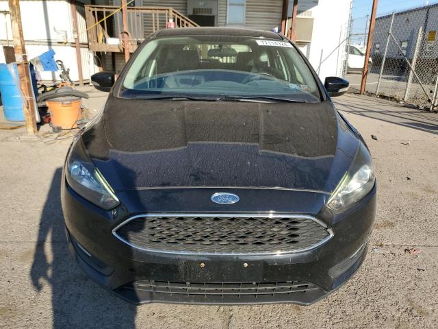 Photo 5 from auction – 2016 FORD FOCUS SE with VIN 1FADP3K27GL357199