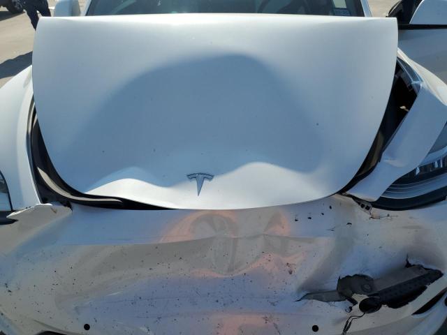Photo 12 from auction – 2022 TESLA MODEL Y with VIN 7SAYGAEE0NF361796