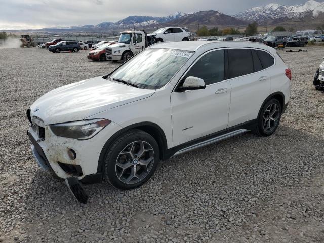 BMW X1 XDRIVE2 2016 with VIN WBXHT3C3XGP885085 - Photo from auction
