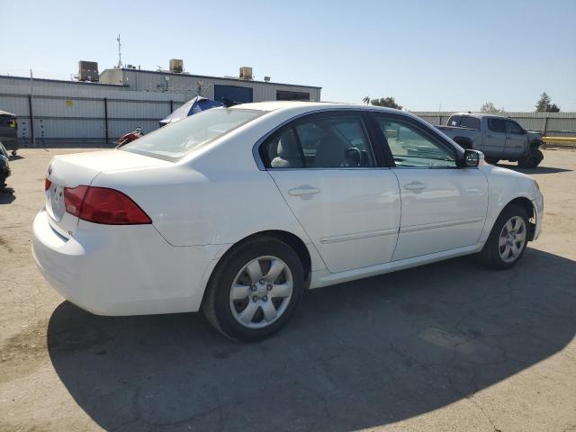 Photo 3 from auction – 2009 KIA OPTIMA LX with VIN KNAGE228195299932