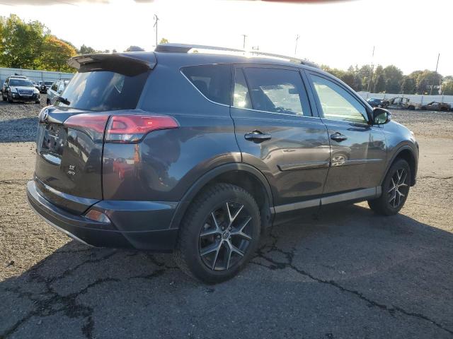 Photo 3 from auction – 2018 TOYOTA RAV4 SE with VIN JTMJFREV6JJ218077