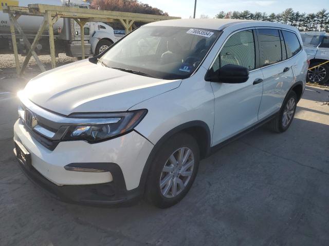 HONDA PILOT LX 2019 with VIN 5FNYF6H1XKB077173 - Photo from auction