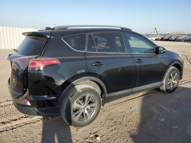 Photo 3 from auction – 2017 TOYOTA RAV4 XLE with VIN 2T3RFREV3HW674844