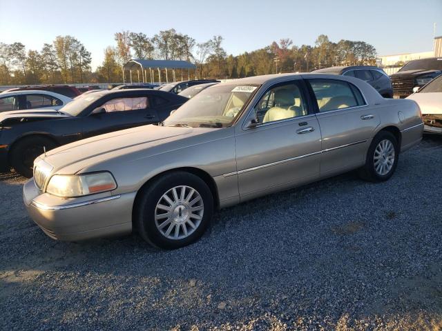 LINCOLN TOWN CAR E 2004 with VIN 1LNHM81W74Y633171 - Photo from auction