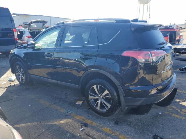 Photo 2 from auction – 2017 TOYOTA RAV4 XLE with VIN 2T3RFREV5HW681164