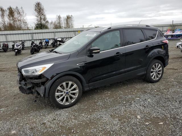 FORD ESCAPE TIT 2017 with VIN 1FMCU9J96HUE24365 - Photo from auction