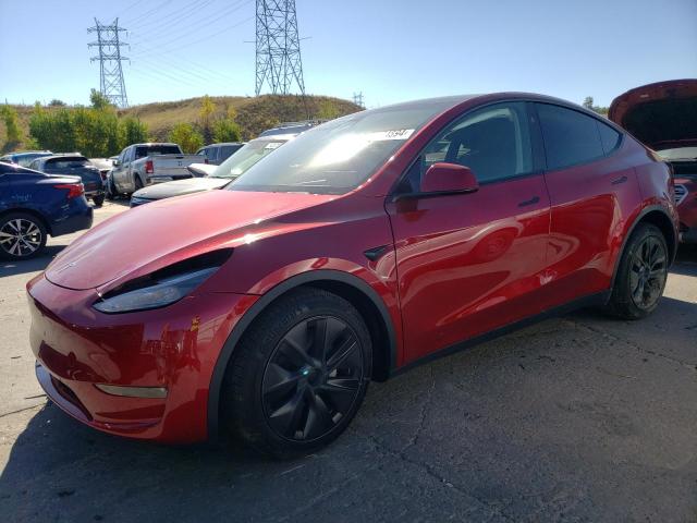TESLA MODEL Y 2024 with VIN 7SAYGAEE9RF198765 - Photo from auction