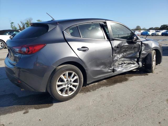 Photo 3 from auction – 2014 MAZDA 3 TOURING with VIN JM1BM1L74E1149301