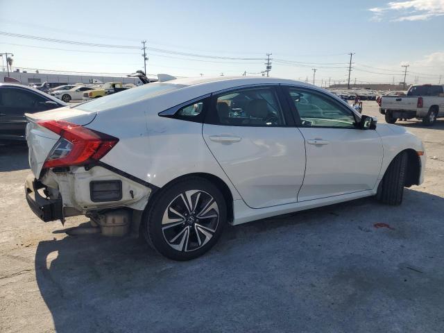 Photo 3 from auction – 2016 HONDA CIVIC EXL with VIN 2HGFC1F74GH657287