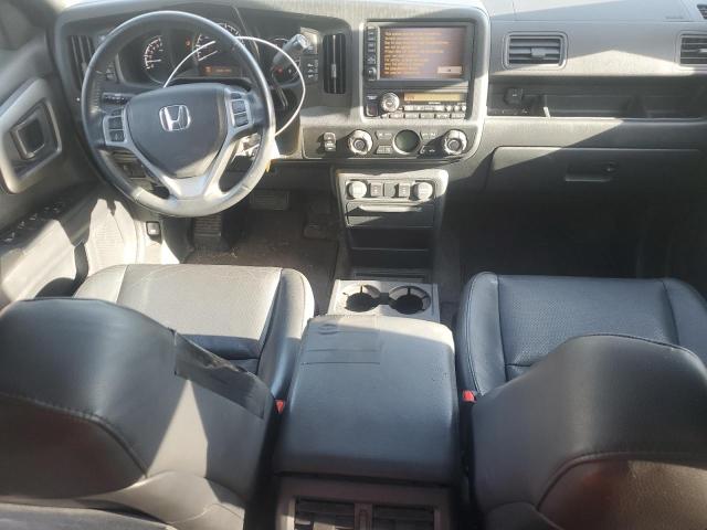 Photo 8 from auction – 2014 HONDA RIDGELINE with VIN 5FPYK1F63EB012688