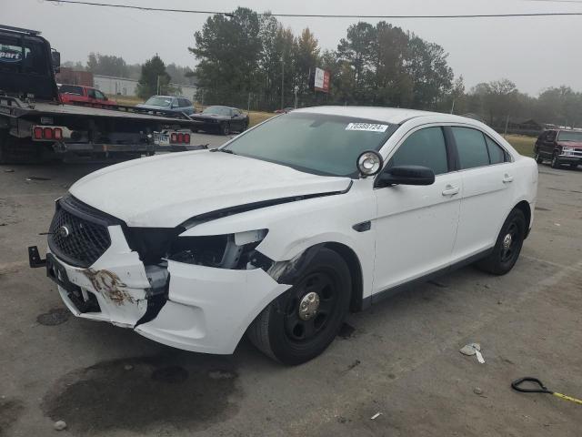 FORD TAURUS POL 2013 with VIN 1FAHP2L82DG212963 - Photo from auction