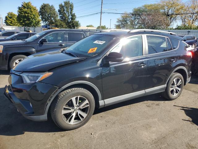 TOYOTA RAV4 XLE 2017 with VIN 2T3RFREV5HW637892 - Photo from auction