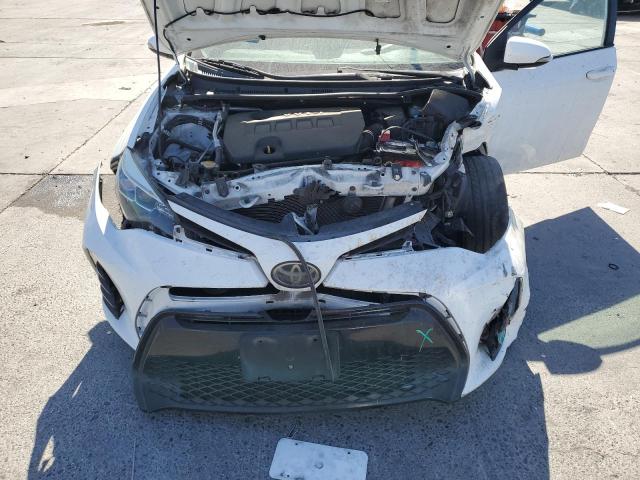 Photo 11 from auction – 2017 TOYOTA COROLLA L with VIN 5YFBURHE2HP661497