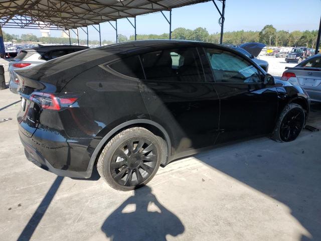 Photo 3 from auction – 2023 TESLA MODEL Y with VIN 7SAYGDEE3PA110482