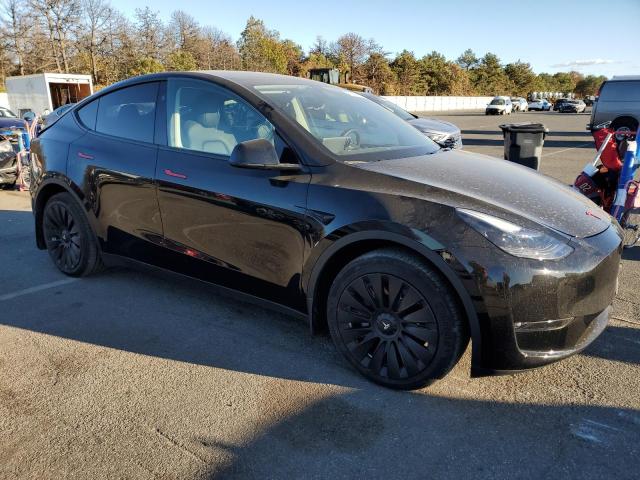 Photo 4 from auction – 2023 TESLA MODEL Y with VIN 7SAYGAEE7PF896899