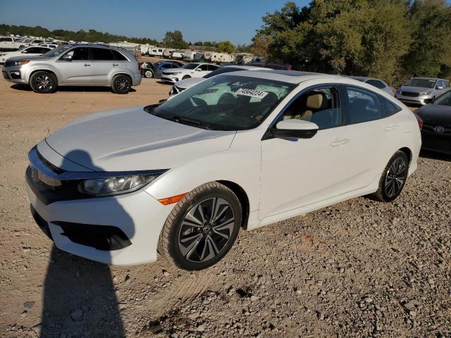 HONDA CIVIC EXL 2017 with VIN 19XFC1F7XHE005561 - Photo from auction