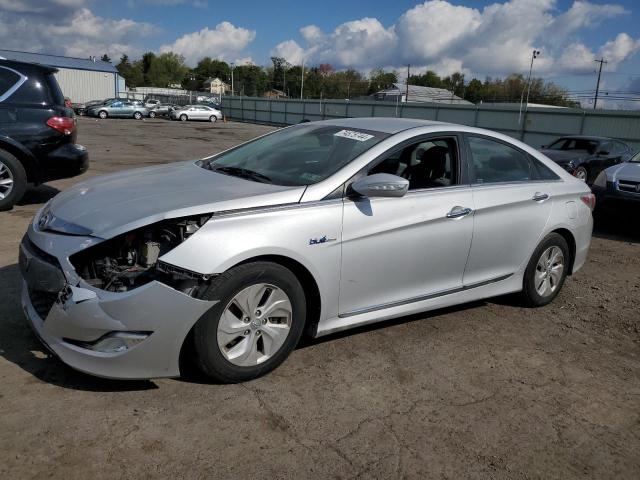HYUNDAI SONATA HYB 2014 with VIN KMHEC4A48EA117473 - Photo from auction